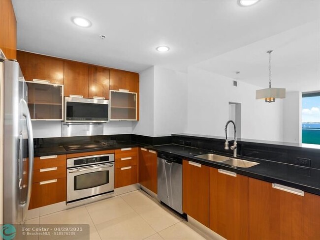 Building Photo - 7901 Hispanola Ave