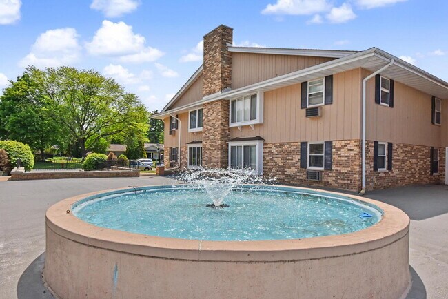 Building Photo - "Charming 2-Bed Condo Retreat: Comfort & Convenience in Brown Deer!"