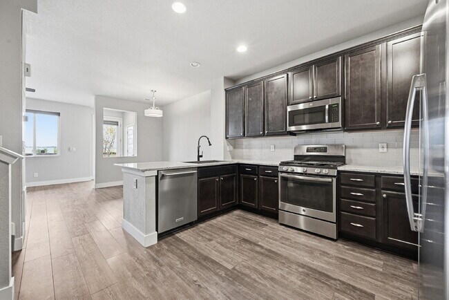 Building Photo - $2,695.45 3-bed, 2.5-bath townhome with a washer and dryer.
