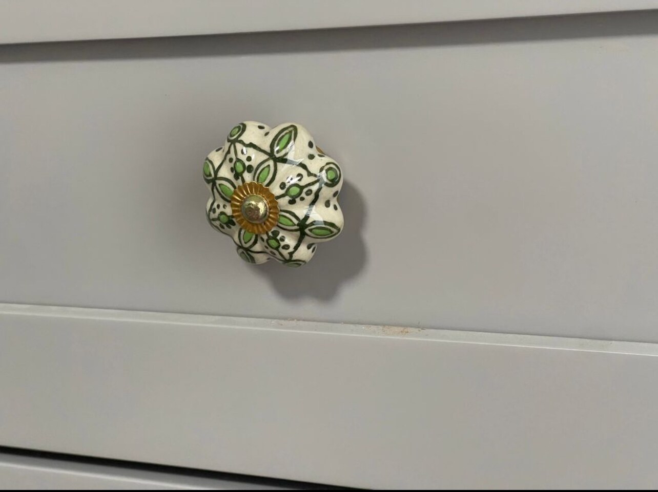 Assorted ceramic knobs in the kitchen. - 3477 Hibiscus St