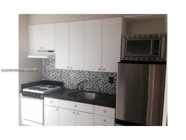 Building Photo - 9920 Collins Ave