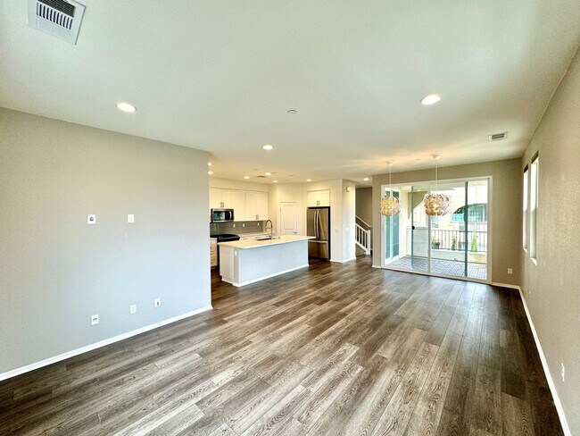 Building Photo - Spacious 4BD/3.5BA Townhome in Oceanside with Community Pool, 2-Car Garage & Covered Balcony