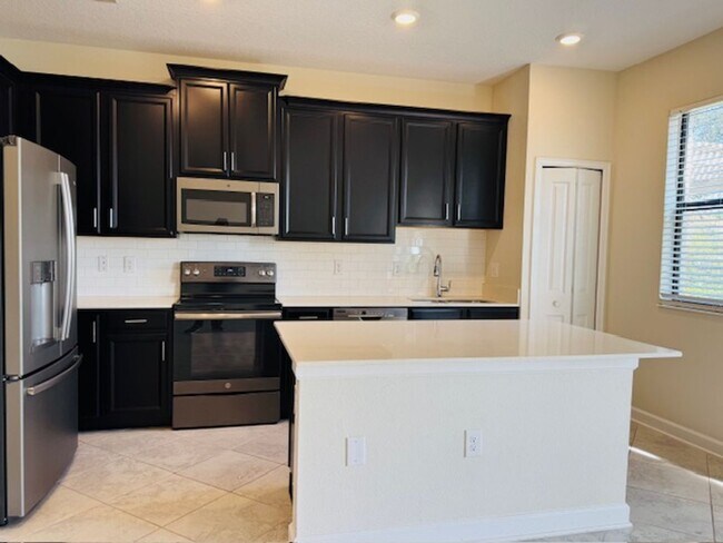 Building Photo - For Rent in ChampionsGate 3/2.5 Townhouse with Water View