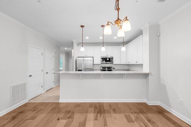 Building Photo - Waterfront Living at Its Finest - Beautifully Remodeled 3BR/2BA, 1st Floor, End Unit Condo on Lak...