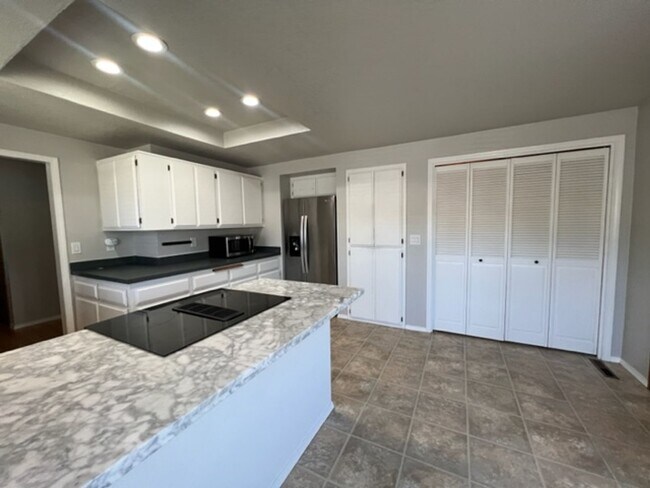 Building Photo - SINGLE LEVEL HOME W/ MANICURED YARD WITH  ...
