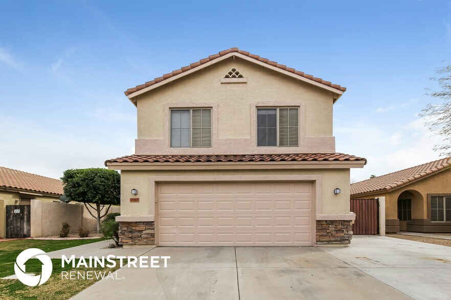 Building Photo - 7013 W Aire Libre Ave