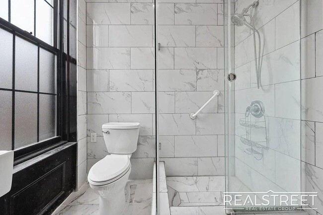 Building Photo - Timelessly Renovated Historic Triplex with...