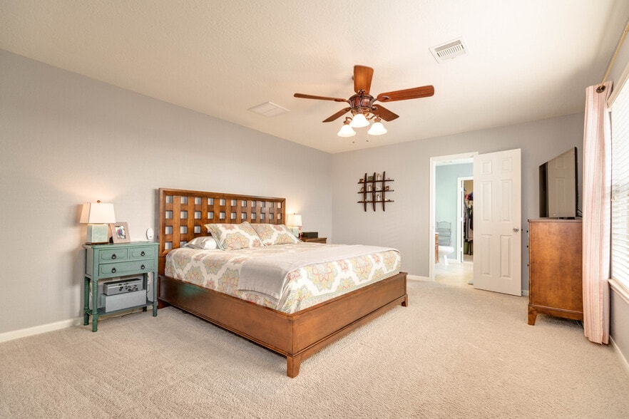 Master bedroom downstairs -now tile, no carpet. - 2635 Skyview Knoll Ct