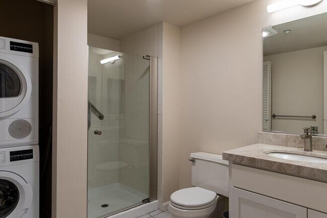 Bathroom 2 - full bath with shower, toilet, sink, and laundry - 500 N St