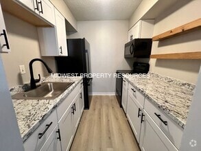 Building Photo - Stunning 1 Bedroom Apartment w/ Covered Pa...