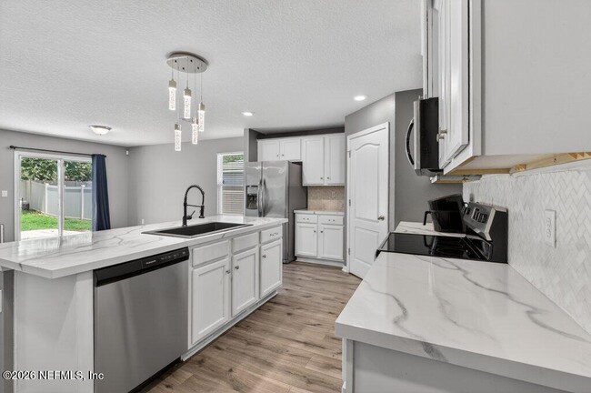 Building Photo - 9099 Tahoe Ln