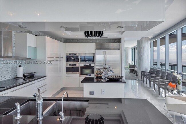 Building Photo - 17121 Collins Ave