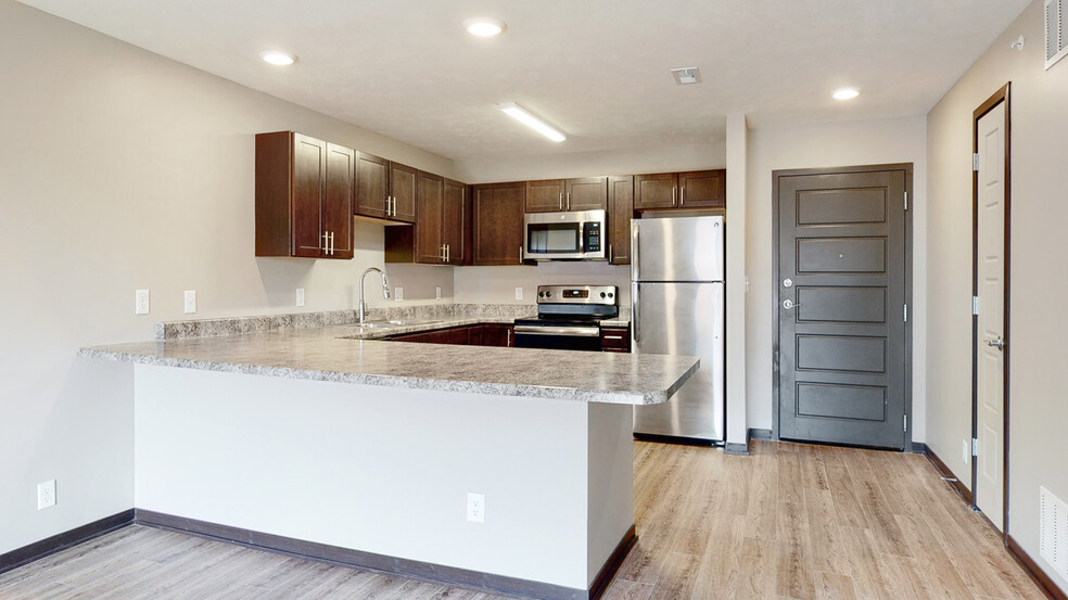 Our fully renovated Maple kitchen. - Northridge Heights Apartments