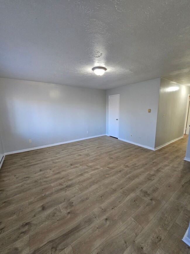 Building Photo - SPACIOUS THREE BEDROOM HOME LOCATED NEAR 2...