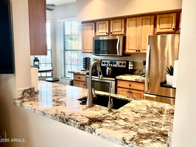 Building Photo - 14950 W Mountain View Blvd