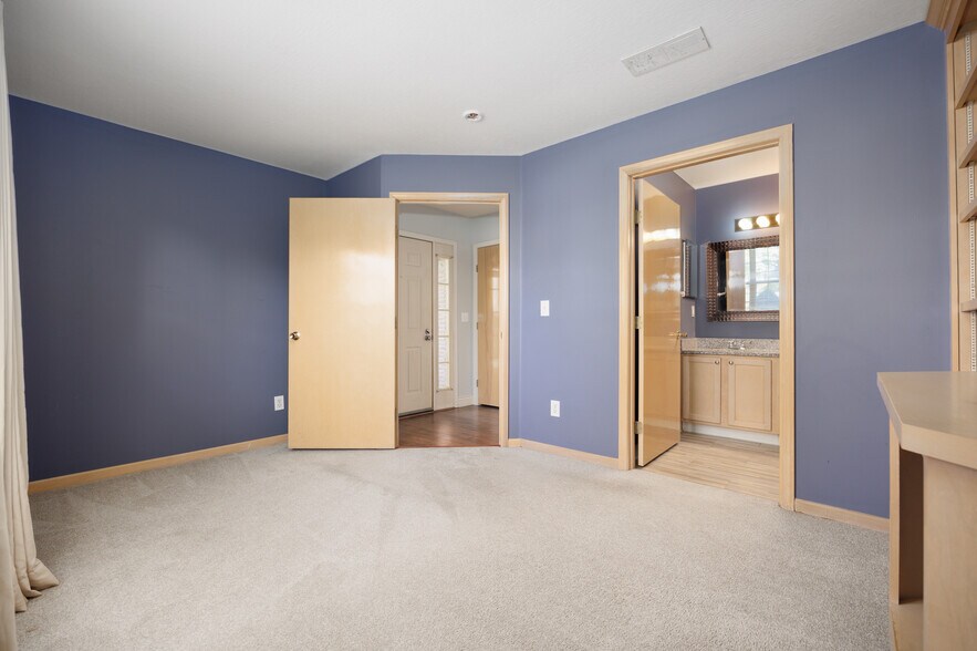 bedroom/office with attached ½ bath - 3906 Sandstone Cir