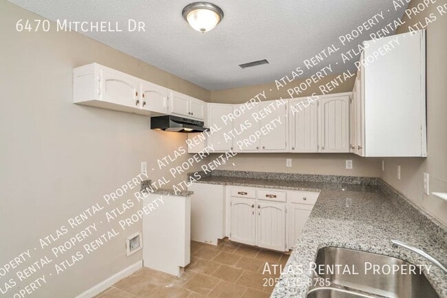 Building Photo - 6470 Mitchell Dr