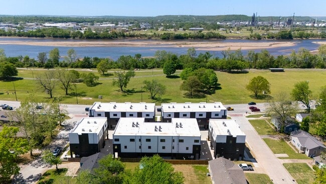 Building Photo - Discover modern elegance in the newly constructed Edgewater Condominiums, a boutique community fe...