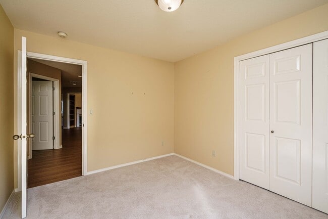 Building Photo - Beautifully Landscaped 1/4 acre with Well Maintained 4 bedroom 2 Bath Home with 3 Car Garage