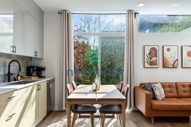 Building Photo - Offer: Unfurnished option available at $3,250, with an optional furnished package for an addition...