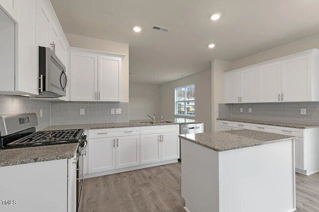 Building Photo - Spacious 4BR home in Wendell with trees in...