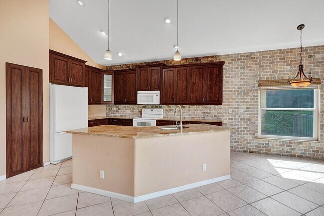 Building Photo - Amazing 4 Bedroom, 3 Bath home plus large 21'x11' loft located in Parkland Isles!