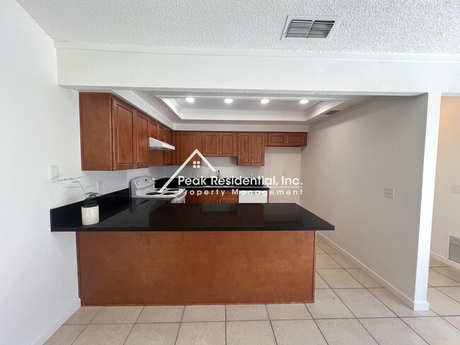 Building Photo - Spacious Updated 2bd/2ba Halfplex with 2 Car Garage