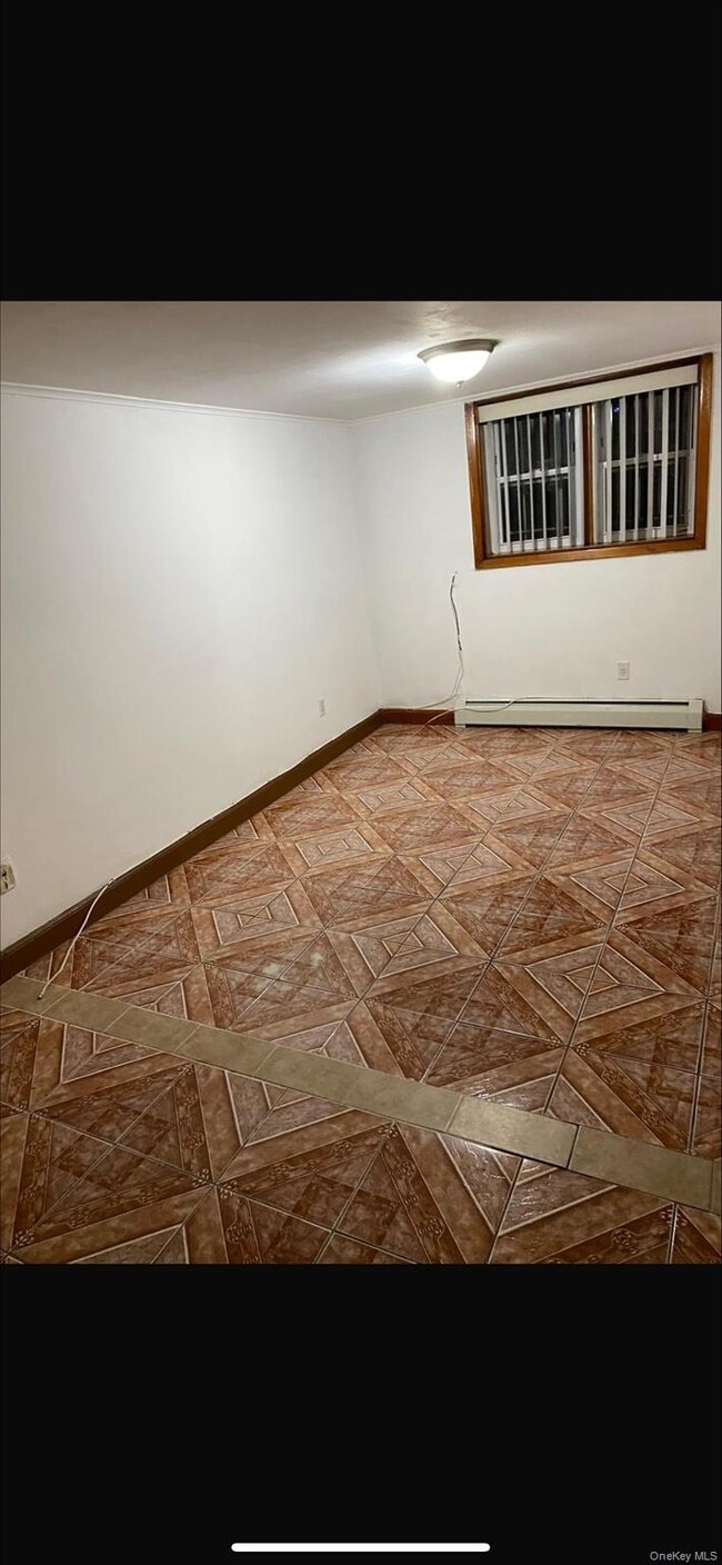 Building Photo - 25-36-36 76th St