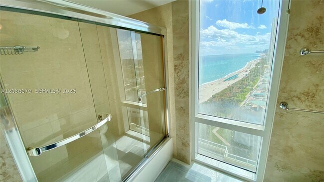 Building Photo - 16699 Collins Ave