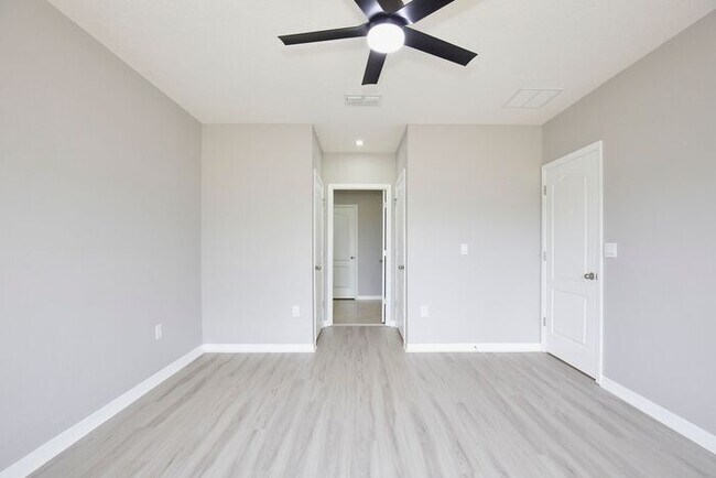 Building Photo - Move-In Ready 2BR/2BA Villa with Den + 2-Car Garage | Lake Nona Adjacent | Suncrest at St. Cloud