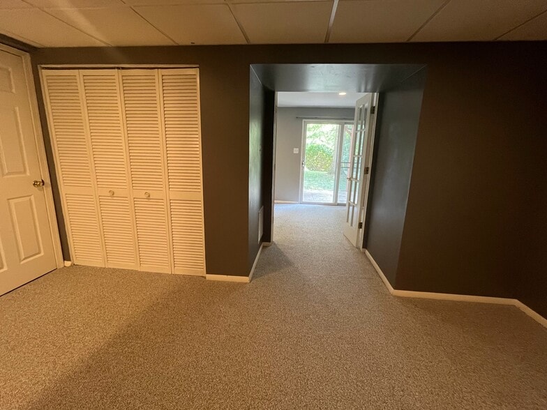 Basement Living Room - 9415 Riverbrink Ct