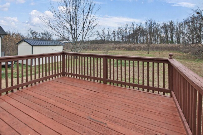 Building Photo - Pet Friendly Three Bedroom with Bonus!