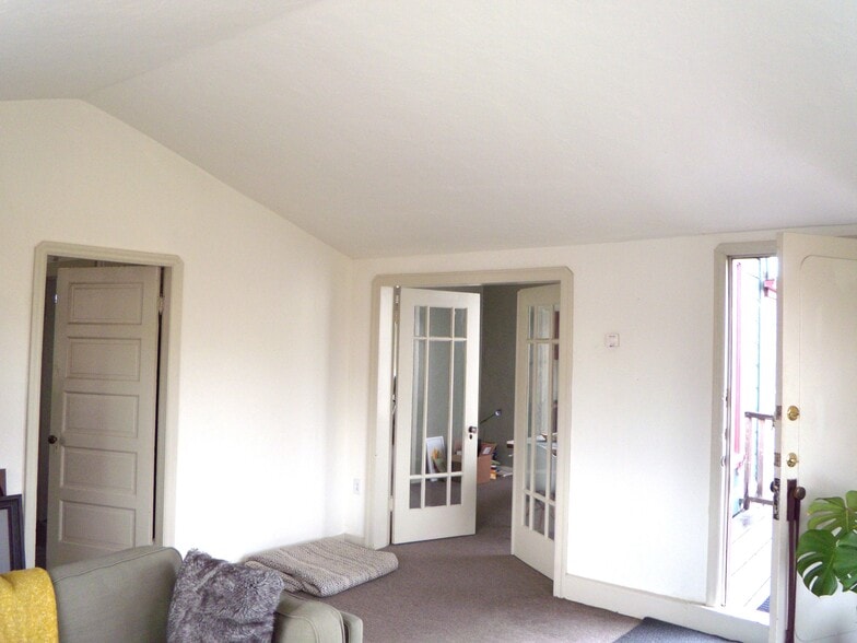 living room looking into dining room - 913 Camelia St