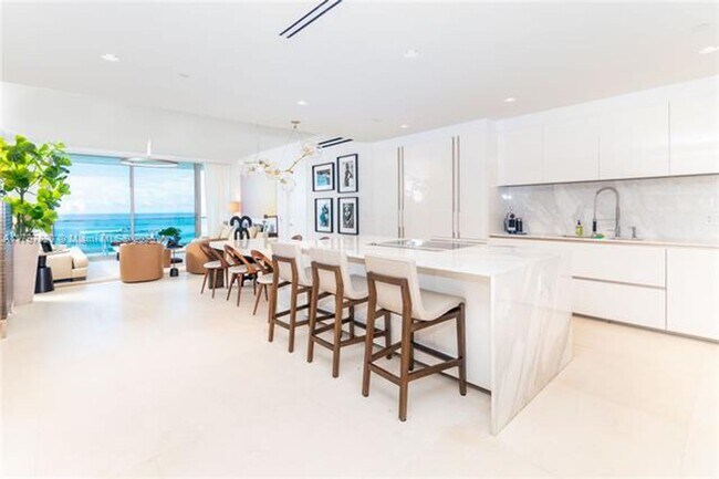 Building Photo - 10201 Collins Ave