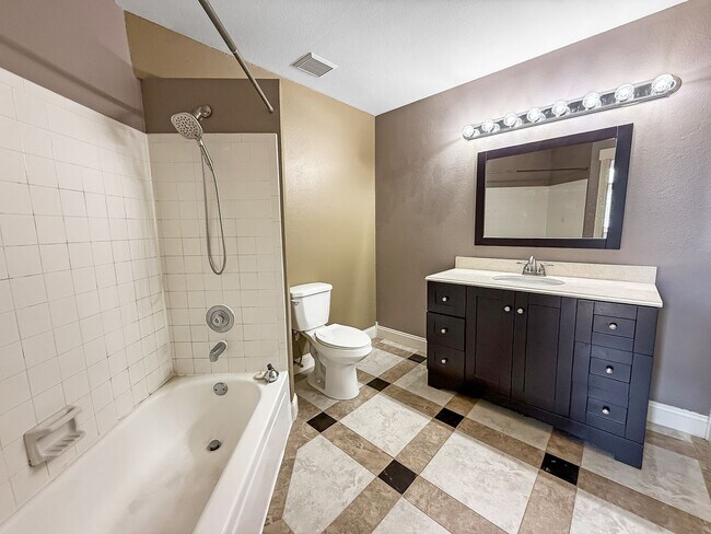 Building Photo - $0 DEPOSIT OPTION. CHARMING TWO-STORY TOWN...