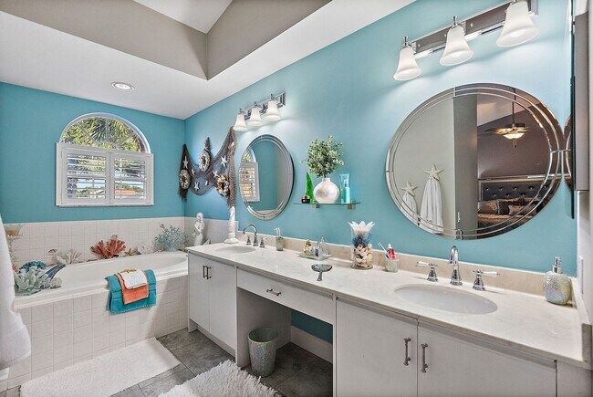 Building Photo - Two Bedroom/Two and a half bath gated townhome.