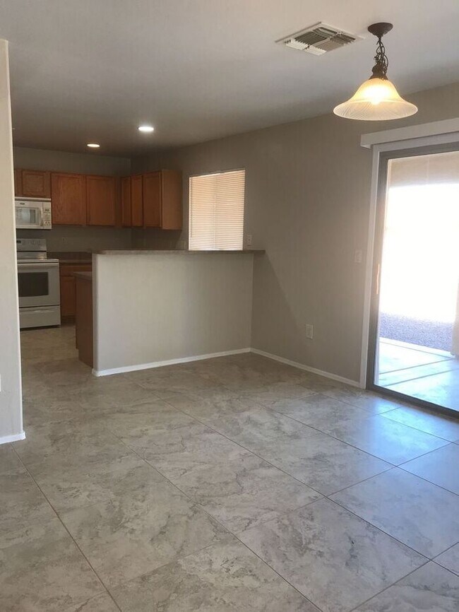 Building Photo - Spacious Marana Living with Loft & Low-Maintenance Appeal