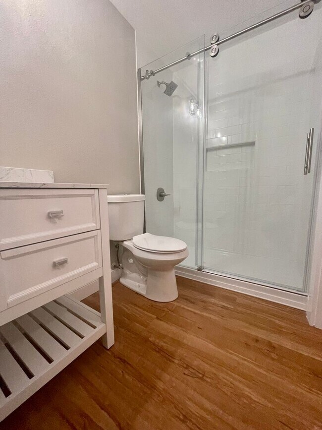 Building Photo - Fully Renovated 2B/2B condo located behind...