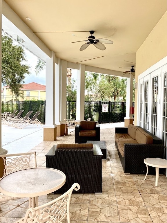 Covered deck is poolside - 1025 Villagio Cir