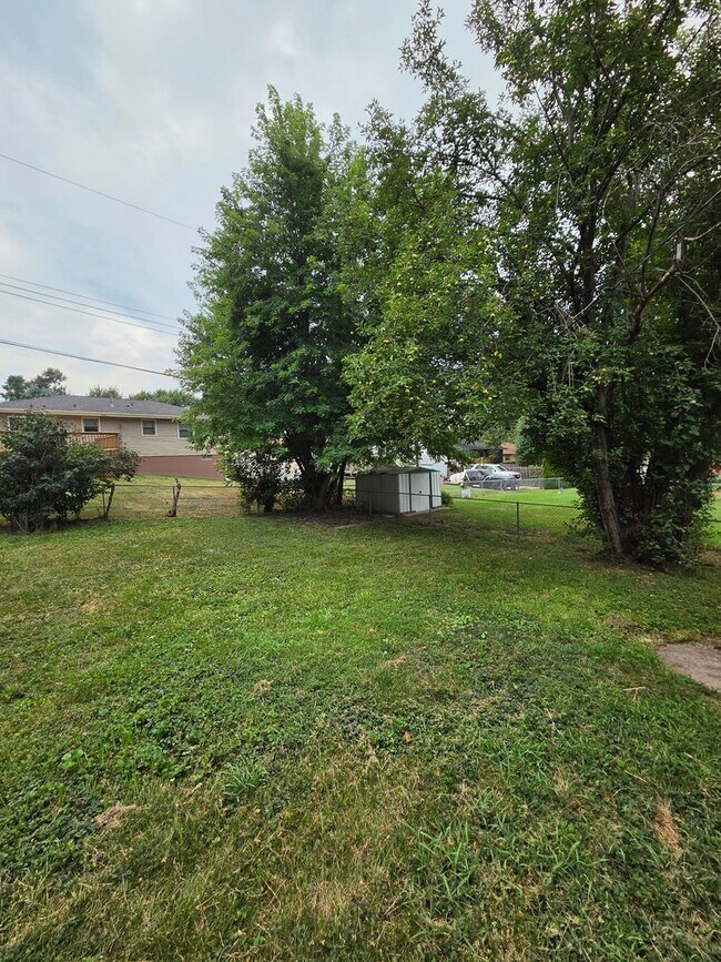 Building Photo - 3/2/1 newly remodeled with a fenced in backyard