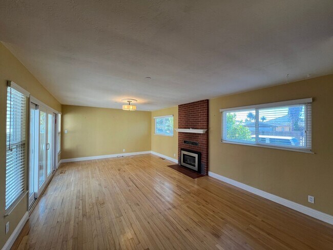 Building Photo - Spacious 4-Bedroom Retreat Just Steps from...