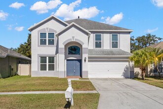 Building Photo - "Spacious 4-Bedroom Gem with 2.5 Baths in ...