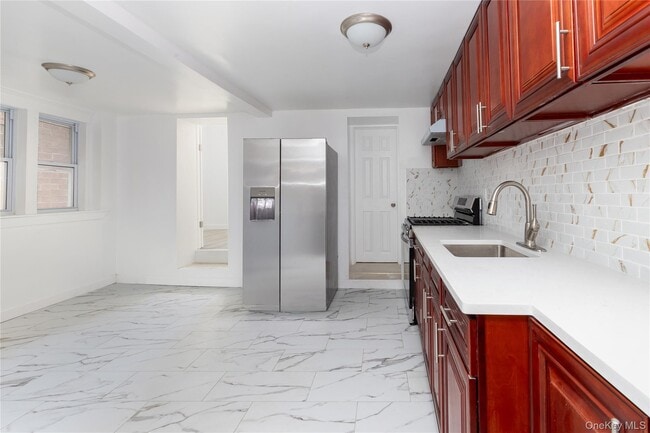 Building Photo - 100-30 Martense Ave