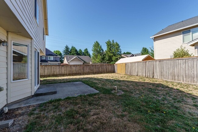 Building Photo - Your Next Home Awaits! 4BR/2.5BA with Fenc...