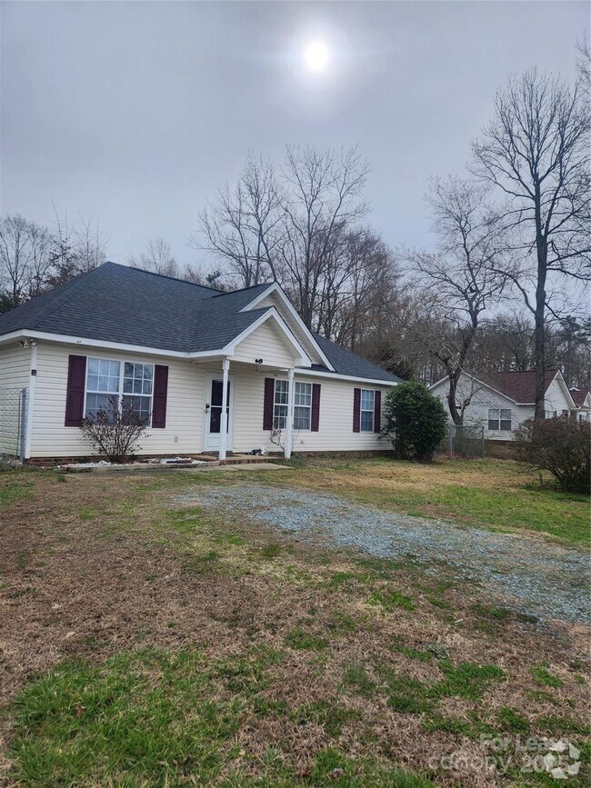 Building Photo - 7106 Windsong Way