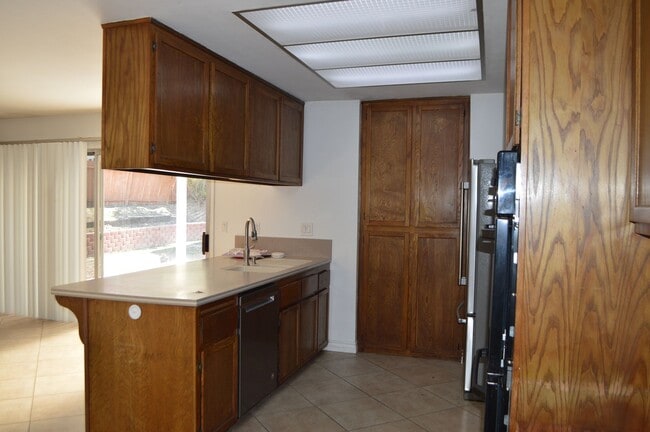 Building Photo - Four Bedroom, Two Bathroom Single Story Home With Two Car Garage