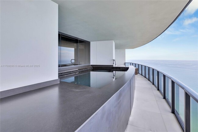 Building Photo - 18555 Collins Ave