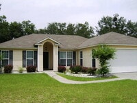Building Photo - Charming 3BR/2BA Home with Open Floor Plan, Vaulted Ceilings & 2-Car Garage