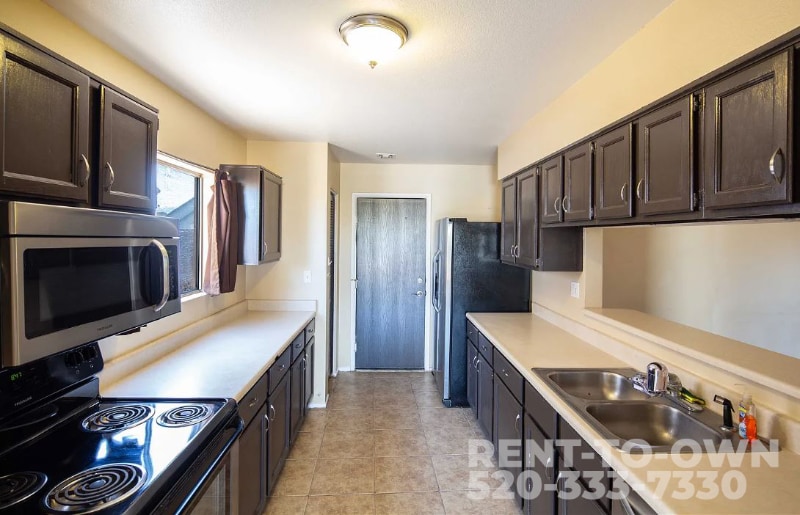 Building Photo - 8661 N Newhill Ave
