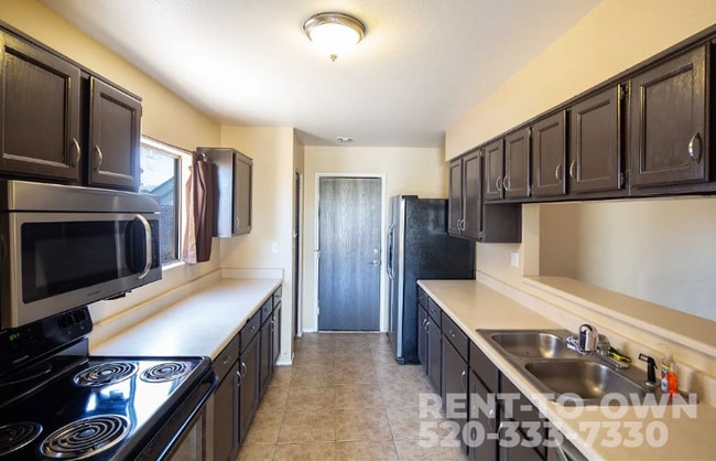 Building Photo - 8661 N Newhill Ave